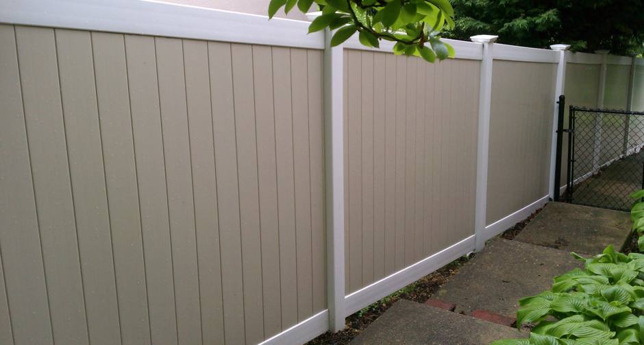 Tan and White Vinyl Privacy Fence