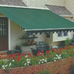 Green Awning over Outdoor Sitting Area