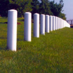 White Bollards in Grass