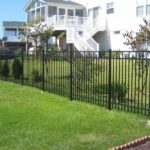 Ornamental Iron Chancellor Fence In Lawn