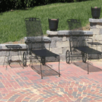 Circle Pattern Patio Pavers and Stone Retaining Wall