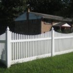 Vinyl Picket Fence in Grass