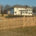Wood Picket Fence on Lawn Boundary