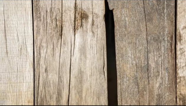 Sun Damaged Wood Fence