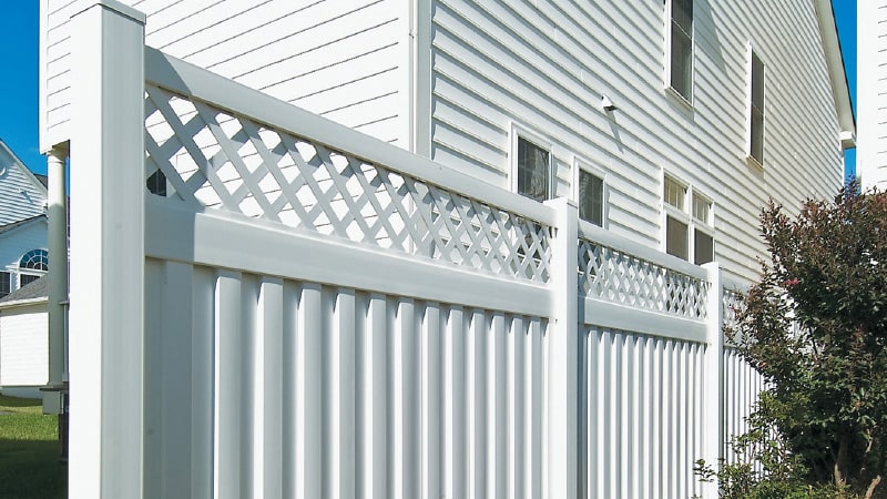 Residential white vinyl fence