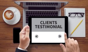 A man checks on client references for a fence company